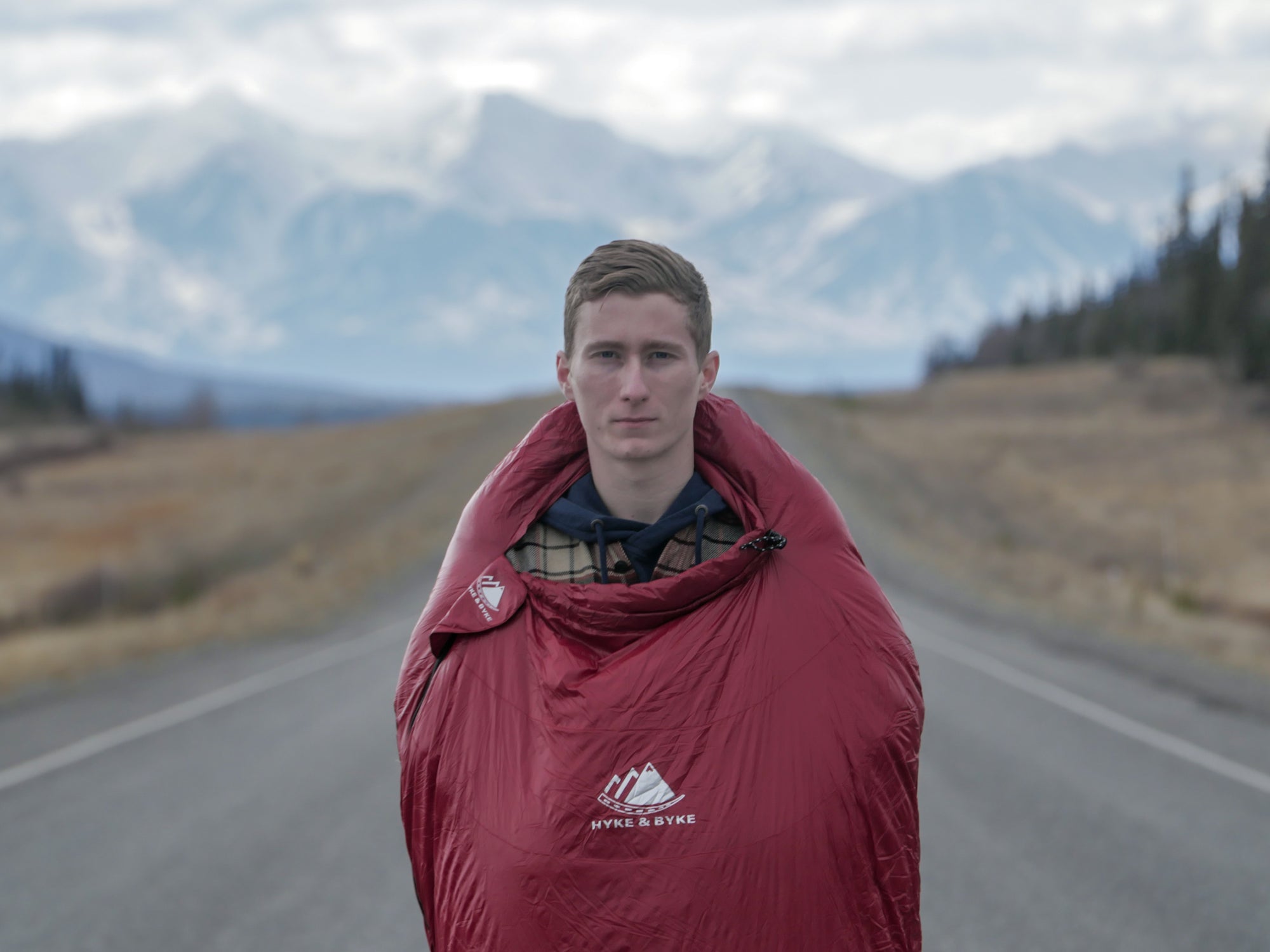 Is it warmer to wear clothes in a sleeping bag?